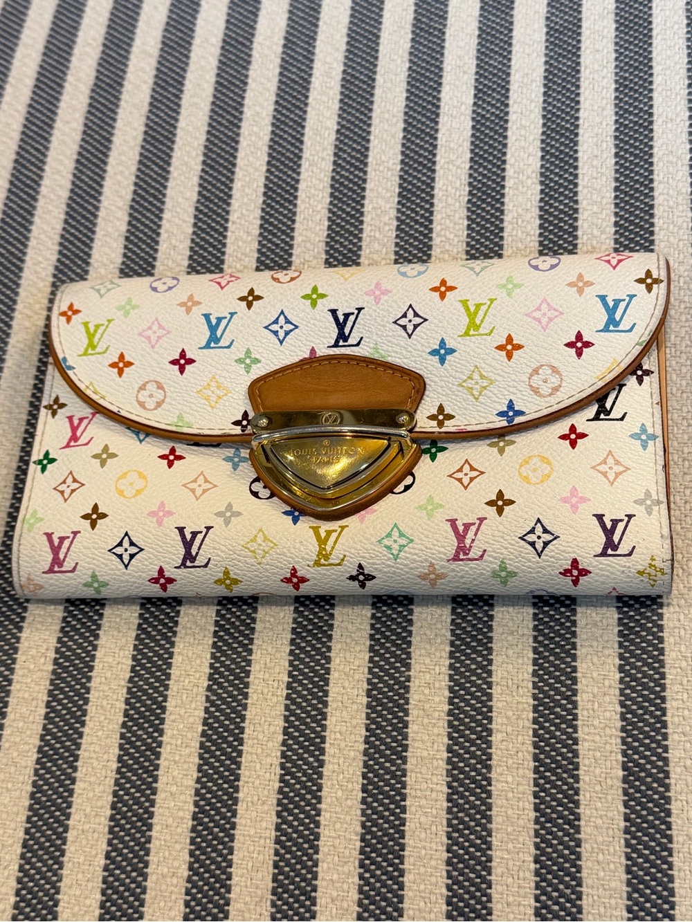 LOUIS VUITTON White Multicolor Monogram Wallet with Gold-Tone Clasp. ❤️🩷💜💙💛💚